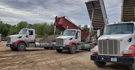 Yocham trucks at a jobsite